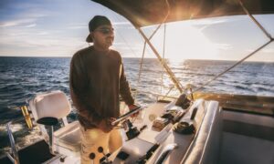 fisherman driving his boat in the gulf of mexico