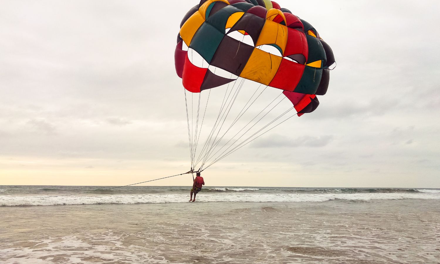 parasailing on the North Carolina coast at sunset